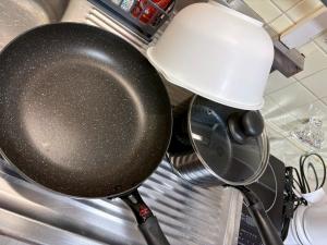 a frying pan on top of a stove at mkh room TAKAMATSU in Takamatsu +20 photos