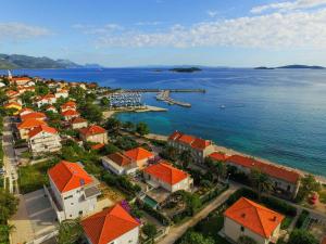 an aerial view of a town next to the water at Holiday Apartment Maria in Orebić