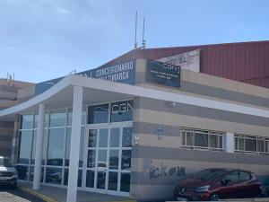 a building with a car parked in front of it at Casa Pavon in Montaña Alta