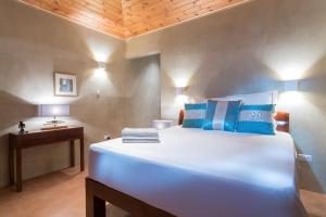Postel nebo postele na pokoji v ubytování Villas Palm Royal