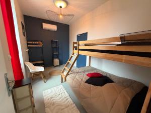 a small room with a bunk bed and a ladder at Les Terrasses du Rhône, Baix in Baix