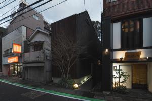 an external view of a building with a street at The LOFT INN NAGASAKI in Nagasaki +46 photos