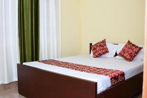 Postel nebo postele na pokoji v ubytování Holidayincoorg Cozy Nest