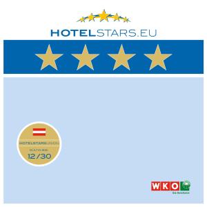 a set of five gold stars and a blue ribbon with the words houston stars at Aparthotel Adrenalin in Kappl