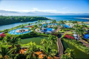 an aerial view of the pool at the resort at Mayan Palace at Vidanta Vallarta in Puerto Vallarta
