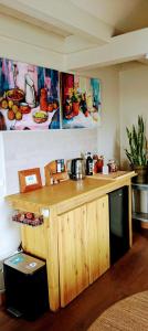 a kitchen with a wooden counter top in a room at 't Herenhoes in Neerpelt +9 photos