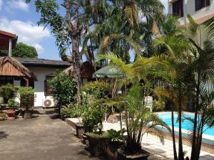 En terrasse eller udendørsområde på Villa Sisavad Guesthouse