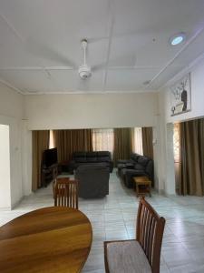 a living room with a couch and a table at Mtwapa- North Coast in Mtwapa