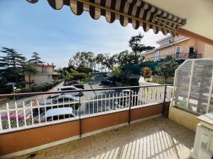 a balcony with a view of a parking lot at Suite Semeria 466 - Sanremo in Sanremo
