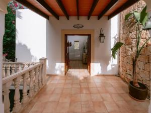 a hallway of a house with a staircase at Villa in Cala Llonga near Beach & Ferry Port in Cala Llonga