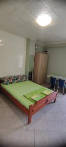 a bedroom with a large bed in a room at Apartman Tomas in Herceg-Novi