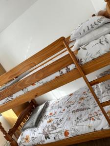 a couple of bunk beds in a room at Tranquility at Sandown Bay in Sandown