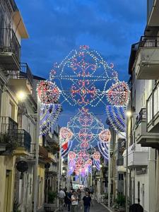 a street decorated with christmas lights in a city at B&B da Nic e Ste in Casalbordino