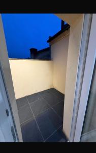 a view from the inside of a balcony of a building at Grande rue in Roubaix