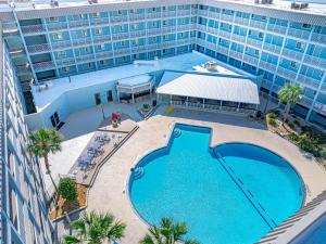 an overhead view of a swimming pool in front of a building at Resort Retreat - Multiple Pools - Beach Access in Hilton Head Island