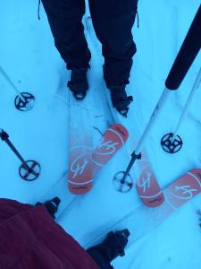 a group of people standing in the snow with skis at Nature resort Linnunrata in Oulu