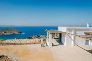 a view of the ocean from the roof of a house at Sunset Heaven Villa on Kea in Korissia