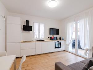 Kuhinja oz. manjša kuhinja v nastanitvi GINO SUITES - Bilocali Luxury - Appartamenti vicini a Rho Fiera e Milano