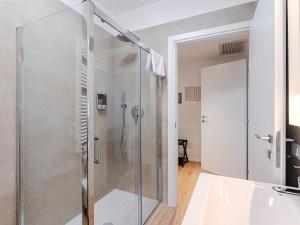 Kopalnica v nastanitvi GINO SUITES - Bilocali Luxury - Appartamenti vicini a Rho Fiera e Milano + 12 fotografij