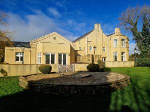 a large house with a garden in front of it at Hamilton Luxury - The James Suite in Scorton