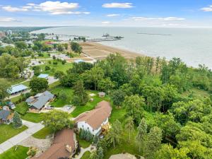 an aerial view of a house and the ocean at Cliffside Suite #3 - Seacliff Beach Suites in Leamington