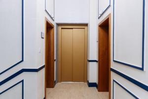 a corridor of doors in an office building at Hotel Kleiner Riesen in Koblenz
