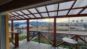 a view from the deck of a house with a view at El refugio de Marisela in Trevelín