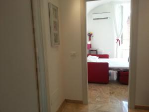 A bed or beds in a room at Between Termini & Colosseo