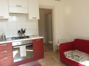 A kitchen or kitchenette at Between Termini & Colosseo