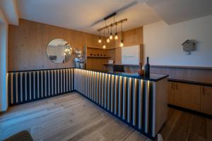 a bar with a black and white railing in a room at Agriturismo Hegemone in Tremosine Sul Garda