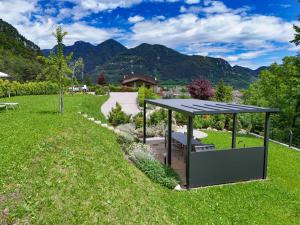a gazebo in the middle of a yard at Agriturismo Hegemone in Tremosine Sul Garda +9 photos