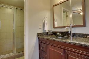 a bathroom with a sink and a shower at Bavarian Brook Condo 12 in Helen