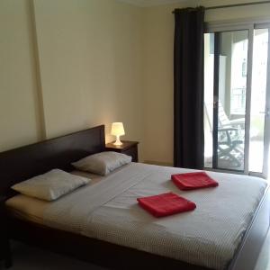 A bed or beds in a room at Apartamento Sunset