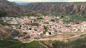 an aerial view of a village in the mountains at El refugio de Águeda in Gorafe