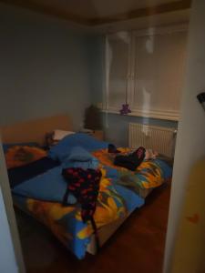 a person laying on a bed in a bedroom at Snp 18 luxury in Košice