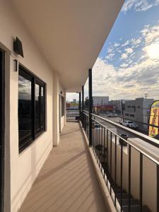 a balcony of a building with a view of a street at RA Suites in Tijuana