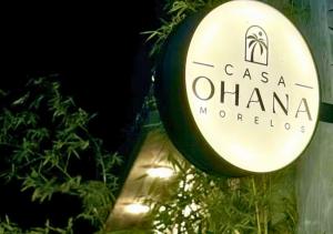 a sign that reads casa oliviana morocco at Casa Ohana Morelos in Tlayacapan