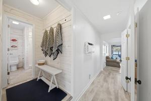a white bathroom with a sink and a toilet at Deep Water Stays on Lake Murray in Lake Murray Shores +33 photos