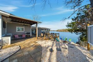 a deck with a view of the water at Deep Water Stays on Lake Murray in Lake Murray Shores