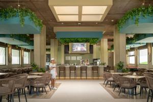 a rendering of the lobby of a restaurant at Riu Flamingos - All Inclusive in Nuevo Vallarta +58 photos