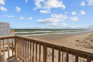 a view of the beach from a deck at Come Enjoy the Best Beach View in Surfside in Surfside Beach