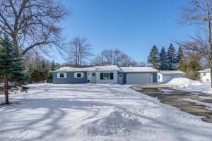 a house with snow on the driveway at Deck, Fire Pit! Fully Updated Home Near Lake Huron in Caseville