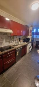 a kitchen with a sink and a washing machine at Charmante chambre chez l'habitant in Ivry-sur-Seine +63 photos