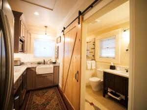 a bathroom with a sink and a toilet at RedTail Inn - 3 Suites Sleeps up to 12 in Ashland +114 photos