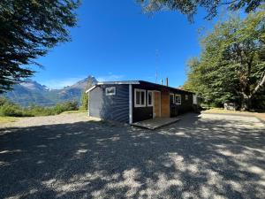 a tiny house sitting in the middle of a driveway at Ventana al Castillo in Villa Cerro Castillo