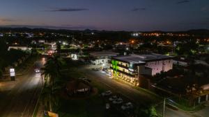 an aerial view of a city at night at Nature Bonito Hotel in Bonito