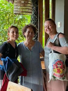 two women and a man posing for a picture at Casa de Campo in Rurrenabaque
