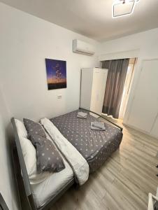 a bedroom with a bed in a room at Kjara's Nest in Neoi Epivates
