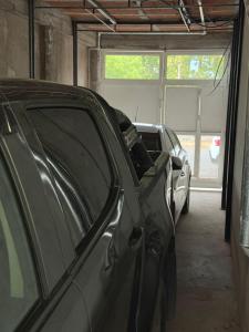 a couple of cars parked in a garage at Apart Sur Catriel in Catriel