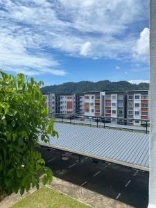 a view of the roof of an apartment building at De' Haven Stay - 10minutes to Airport Tawau in Tawau